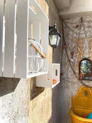 a bathroom with a white cabinet and a sink at Casa Vacanza La Isla Bonita in Isola delle Femmine