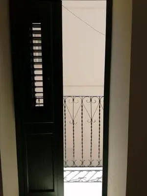 an open door with a balcony in a room at Appartamento centralissimo in Castellammare del Golfo