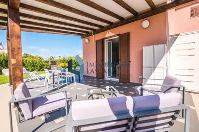 a villa with a view of the patio at Villa Luana, a pochi passi dal mare in Lascari