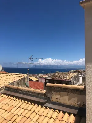 a view of the city from the roof of a building at Casa Colore Attic in Castellammare del Golfo