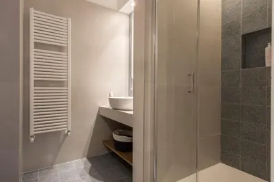 a bathroom with a shower and a sink at Le Niche Holiday Homes by Wonderful Italy in Palermo
