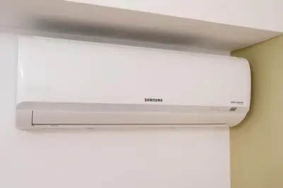a white wall mounted air conditioner in a room at GUEST HOUSE PIANA DEGLI ALBANESI in Piana degli Albanesi