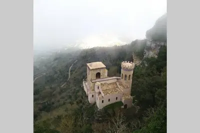 an aerial view of a building on a mountain at Casa vacanza Terra Mare in Castellammare del Golfo
