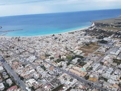 an aerial view of a city and the ocean at Casa vacanza da Samuele in San Vito lo Capo