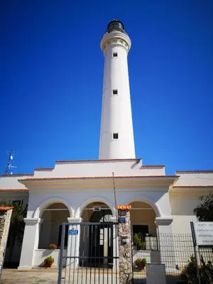 a lighthouse sits on top of a building at Casa vacanza da Samuele in San Vito lo Capo