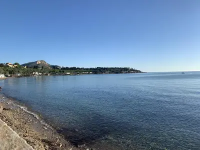 a view of a body of water with a beach at Solus b&b in Casteldaccia