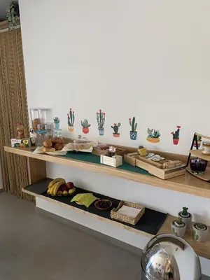 a shelf filled with lots of different types of food at Solus b&b in Casteldaccia