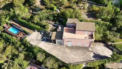 an aerial view of a house with a swimming pool at villa Sun in Alcamo