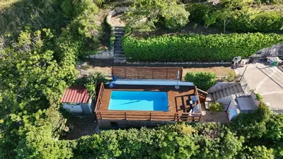 an overhead view of a house with a swimming pool at villa Sun in Alcamo