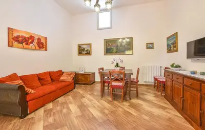 a living room with a couch and a table at Villa Trappeto in Trappeto