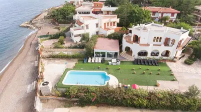an aerial view of a house with a swimming pool at Villa Silvia by Ville in Palermo in Casteldaccia