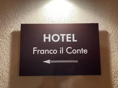 a sign on the wall of a hotel at Franco Il Conte in Bagheria