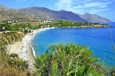 a view of a beach and the ocean at Apartment, Castellammare del Golfo in Castellammare del Golfo