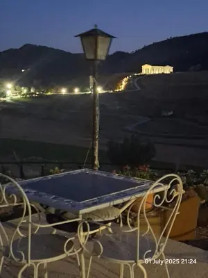 a blue table with a light on top of it at Helimos B&B with Segesta Temple view near Castellammare del Golfo in Calatafimi
