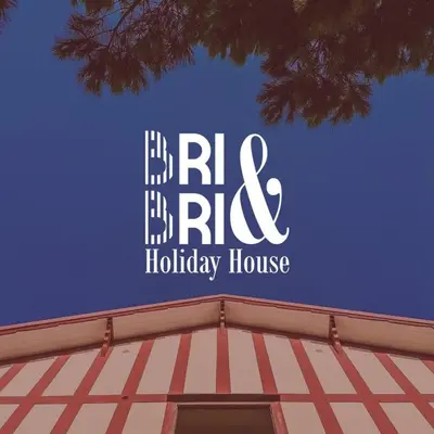 a sign on the top of a holiday house at Bri&Bri Mondello in Palermo