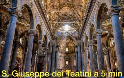 a large building with a domed ceiling and pillars at La Siciliana-di fronte la Cattedrale in Palermo