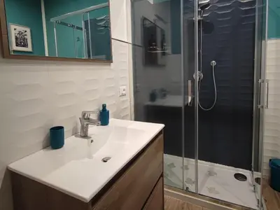 a bathroom with a sink and a shower at Casa del Capo in Palermo