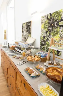 a buffet with many different types of food on it at Divisi Suites & SPA in Palermo