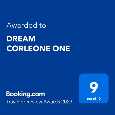 a screenshot of a phone with the text upgraded to dream collaborative one at DREAM CORLEONE ONE in Corleone