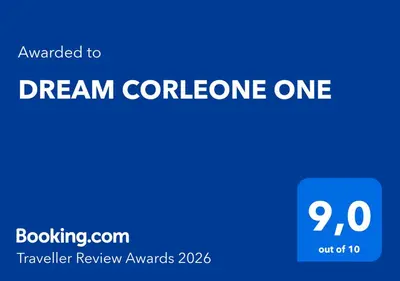 a blue sign with the wordsdream conference one at DREAM CORLEONE ONE in Corleone