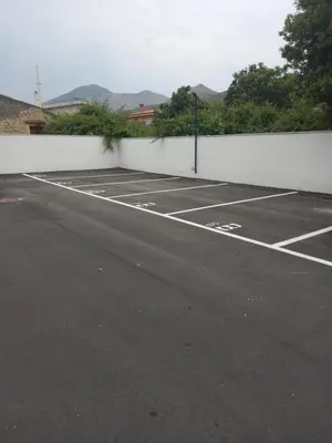 an empty parking lot with two tennis courts at DIMENTICA IL CERVELLO in Palermo