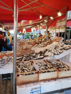 a large display of fish at a market at Stanze Di Leo in Palermo