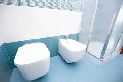 a bathroom with a toilet and a sink at Casa in centro in Castellammare del Golfo