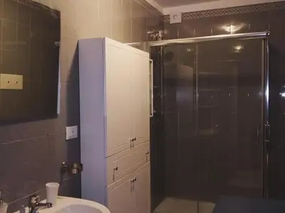 a bathroom with a shower and a sink at Da Ale alla Cattedrale in Palermo