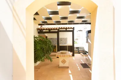 a hallway of a house with a ceiling at Feudo Giglio Country Charme in Calatafimi