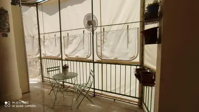 a room with a window with a table in it at POLICLINICO HOME in Palermo