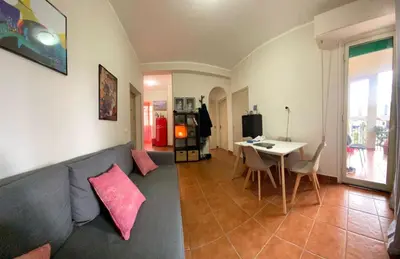 a living room with a couch and a table at Casa dello Spasimo in Palermo