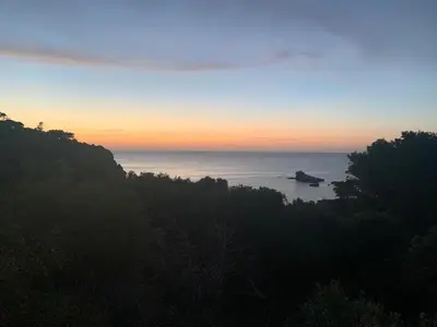 a view of a body of water at sunset at Le Case Vacanze di Federico in Terrasini