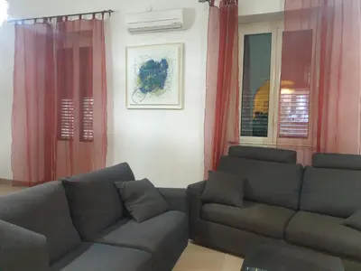 a living room with two couches and a couch at A Casa Tua in Palermo