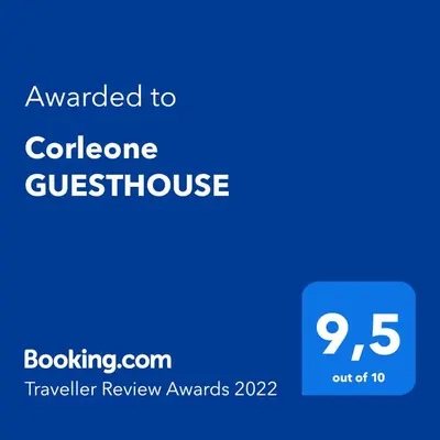 a blue phone screen with the text awarded to cate cone greenhouse greenhouse at Corleone GUESTHOUSE in Corleone