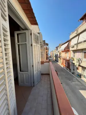 an open door on the side of a building at Casa Vacanze Salvatore in Balestrate