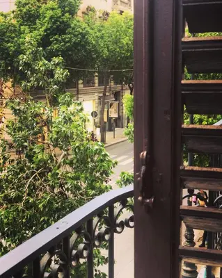 a view of a city street from a balcony at B&B Angolo83 Palermo centro in Palermo