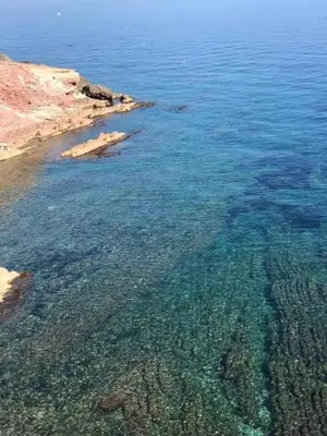 an aerial view of the ocean with reefs at Il moro - Casa Vacanze in Terrasini