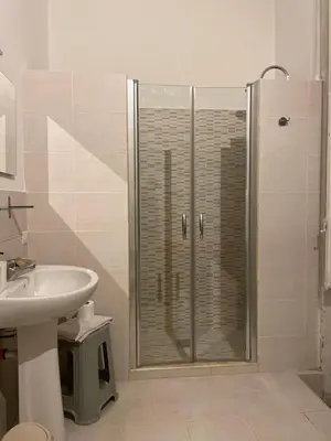 a bathroom with a shower and a sink at 100 PASSI al Massimo in Palermo