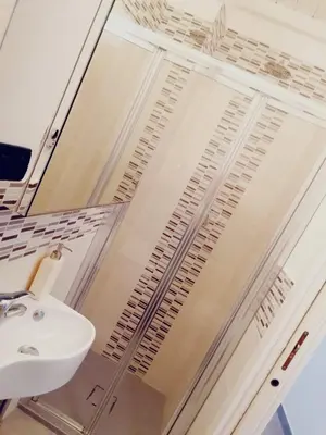 a bathroom with a sink and a mirror at Historic Centre - Apartment Near Teatro Massimo in Palermo