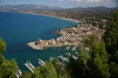 a view of a harbor with boats in the water at Sicilia Ovest - Terrazza Orologio e Terrazza Sul Mare in Castellammare del Golfo