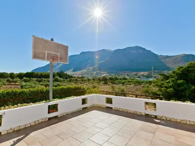 a basketball hoop with a view of the mountains at Villa Tenute Aversa by Interhome in Castellammare del Golfo