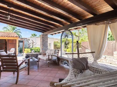 a porch with a hammock on a house at Villa Nicole con Dependance by Interhome in Castellammare del Golfo
