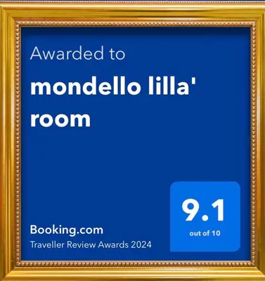 a picture frame with a picture of a room at mondello lilla' room in Palermo
