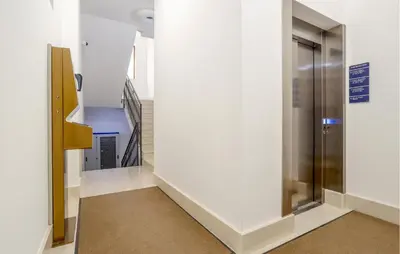 a hallway with a elevator in a building at Cozy Apartment In Balestrate With Wifi in Balestrate