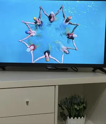 a television screen with a group of people dancing at Patio1861 - A Sicilian deluxe apartment in Termini Imerese