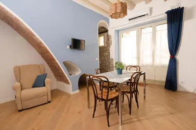a dining room with a table and chairs at La casetta di Maria alla Ciba in Termini Imerese