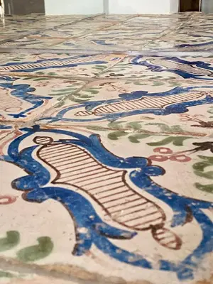 a rug with a painting of a river on a floor at La casetta di Maria alla Ciba in Termini Imerese