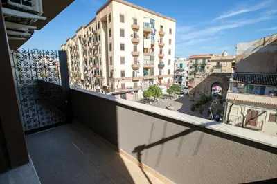 a balcony with a view of a building at B&B Azul in Palermo