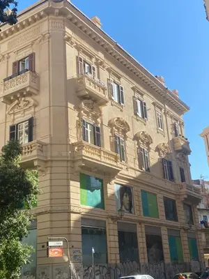 a large building with balconies on the side of it at SuiteInPalermo - case vacanze nel centro storico in Palermo