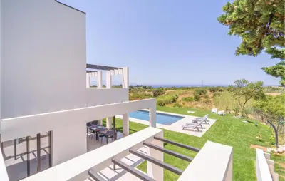 a view of the pool from the balcony of a house at 5 Bedroom Nice Home In Trappeto in Trappeto